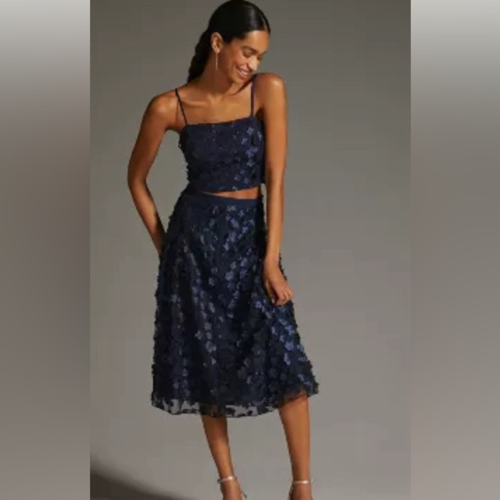 Beautiful NWT Anthropologie navy two piece set. Size 4.